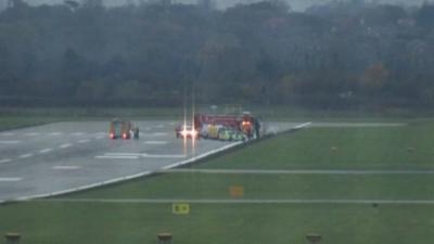 Emergency services at crash scene at Hawarden Airport, Flintshire