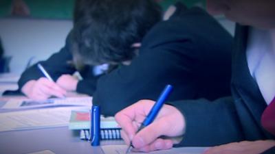 Pupils working in a classroom