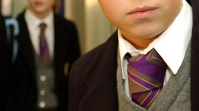 Boy in school uniform