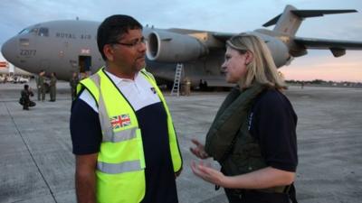 Justine Greening MP (right), being greeted by UK Ambassador to the Philippines Asif Ahmad