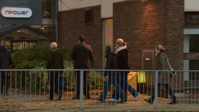 Workers arriving at Npower in Stoke on Trent