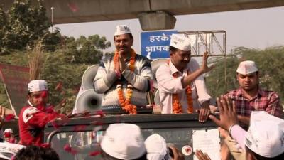 Two men on car