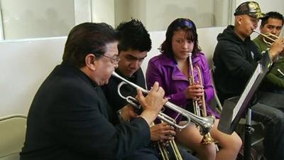 Veteran mariachi Fernando Torres teaches youngsters in the newly inaugurated school in Mexico City