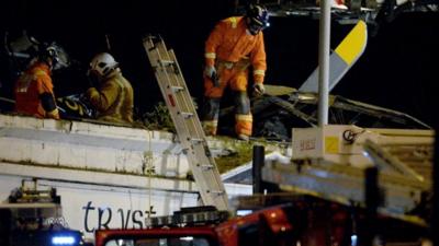 Emergency crew on the roof of the Clutha Vaults pub