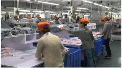 Workers at a factory in Guangdong