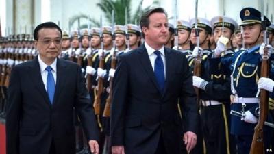 Prime Minister David Cameron is officially welcomed to Beijing by Chinese Prime Minister, Premier Li Keqiang