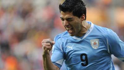 Luis Suarez scores for Uruguay against South Korea at the 2010 World Cup