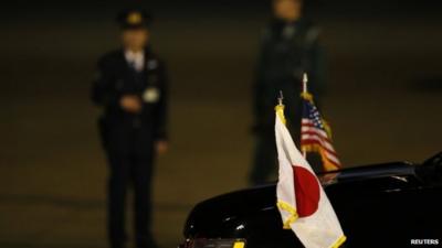 National flags of Japan and US on car carrying US Vice-President Joe Biden