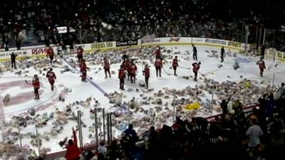 Teddy bears on an ice hockey rink