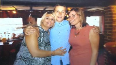 Daniel with his mother and sister