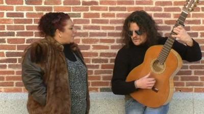 Flamenco singer and man with guitar