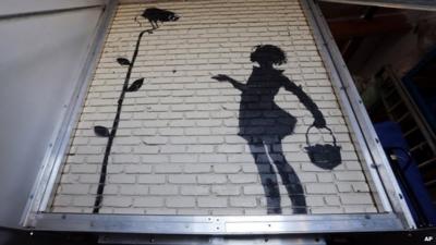 Banksy work Flower Girl