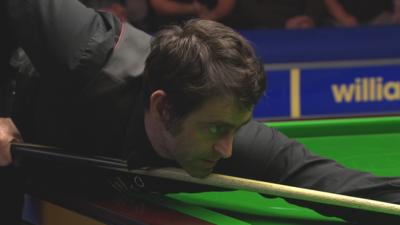 Ronnie O'Sullivan at the table