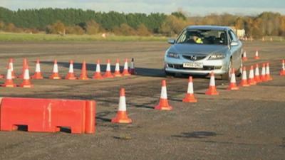 A car is stopped by a device which uses electromagnetic waves