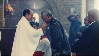 Father Robert Dennis with Nelson Mandela