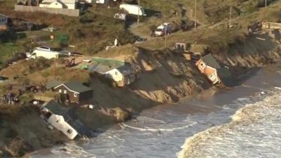 Damaged homes along the coast