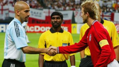 Juan Sebastian Veron and David Beckham shake hands before Argentina v England at the FIFA World Cup in 2002