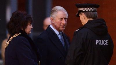 HRH Prince Charles meets with emergency services workers and survivors at the Clutha Bar Helicopter crash site