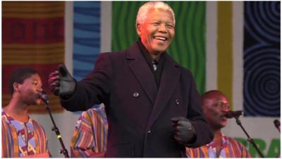 Nelson Mandela on stage with Ladysmith Black Mambazo