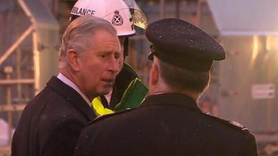 Prince Charles meet representatives of the emergency services during his visit to Glasgow