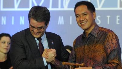 WTO Director General Roberto Azevedo and Indonesia's Trade Minister Gita Wirjawan after the final agreement of the WTO conference