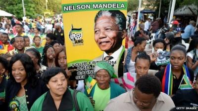 People in Soweto mourn Mandela