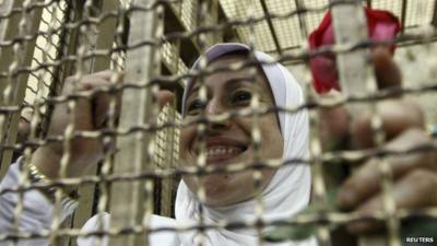 Woman with rose in Cairo court