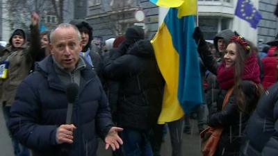 Steve Rosenberg with anti-government protesters