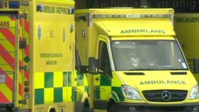 Ambulances waiting outside a hospital