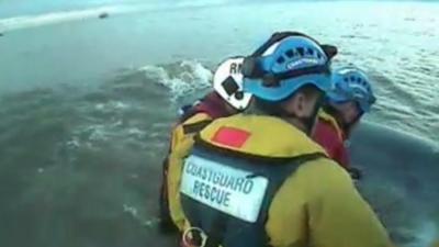 Rescuers in the water