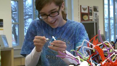 A girl playing with toys