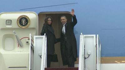 President Obama and his wife Michelle leaving for South Africa