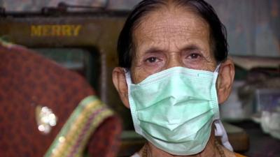 TB sufferer with paper mask