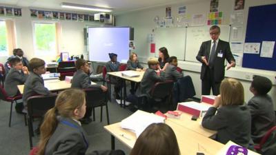 Michael Gove talking to schoolchildren