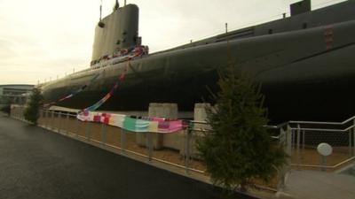 HMS Alliance in Gosport with the giant scarf