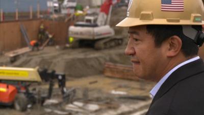 Lobsang overlooks a construction site