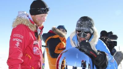 Prince Harry and a fellow adventurer arrive at the South Pole