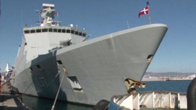 Warship flying Danish flag