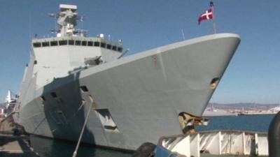 Warship flying Danish flag