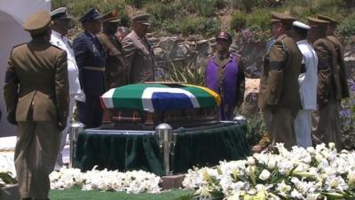 Nelson Mandela's coffin at graveside