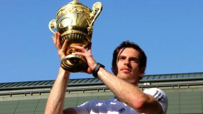 Andy Murray lifts the Wimbledon trophy