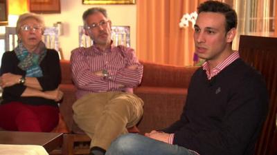 Alberto Barragan (R) and his parents