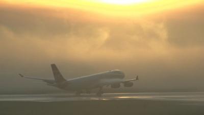 Plane lands on runway