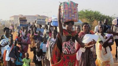 Civilians fleeing fighting arrive at UN compound next to Juba International Airport, 17 December 2013, UN handout pic