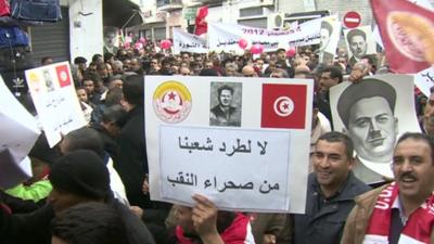 Tunisian protesters rallying in the streets