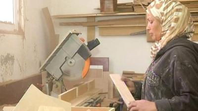 Jordan's first professional female carpenter Aida Al Qurna in her workshop