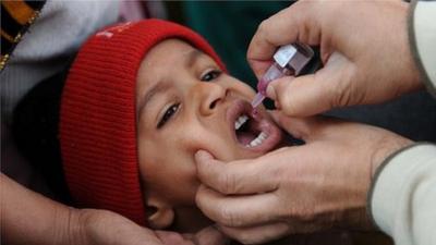 An Indian child gets a polio vaccine in January 2011