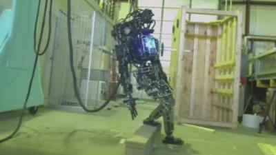 Atlas robot stumbles on concrete block test