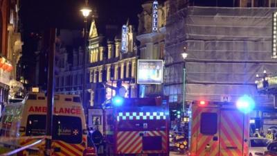 Emergency vehicles outside the Apollo Theatre