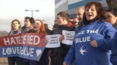 A group of Cardiff fans staged a protest outside the club on Friday